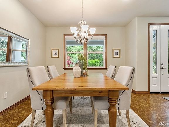 Beautiful and spacious formal dining room is right off of the entry, making it ideal for entertaining!