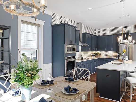 The dining room of the Monet III at Lakeside at Trappe by Brookfield Residential