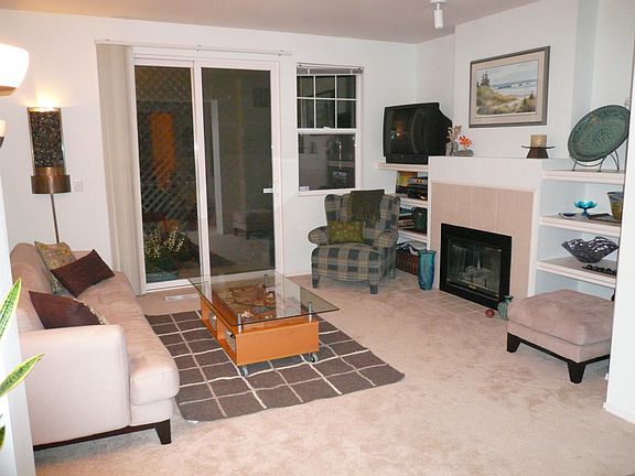 Open family room with high ceilings and xtra large patio doo