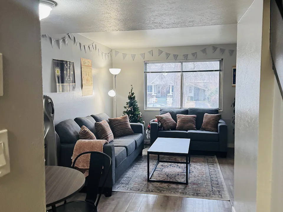 Step into a cozy retreat with stylish furnishings and a warm ambiance.