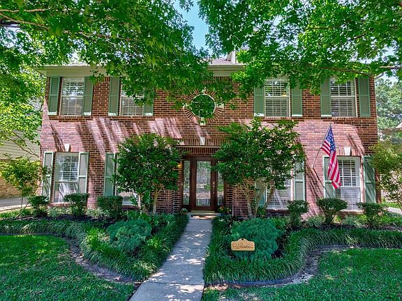 Beautiful landscaping shows off the curb appeal.