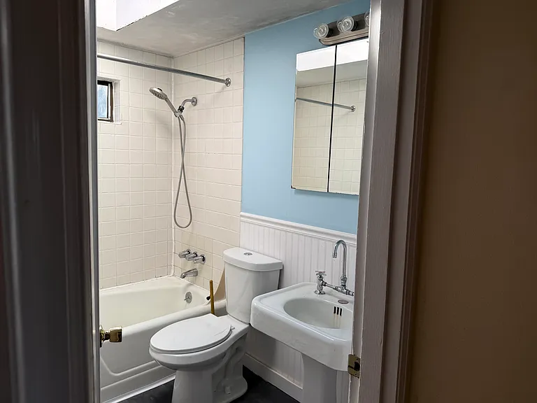 Bathroom, original steel tub keeps water warm, original 1950's pedestal sink