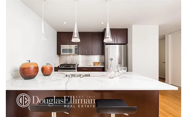 Sold by Douglas Elliman | media 12