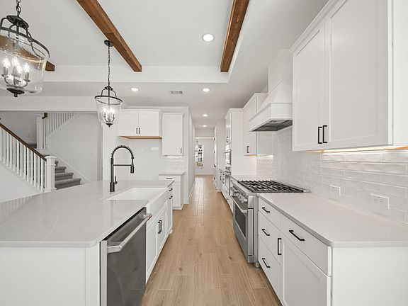 Kitchen with white apron-front sink
