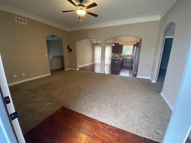 Living Room, kitchen and dining from front door
