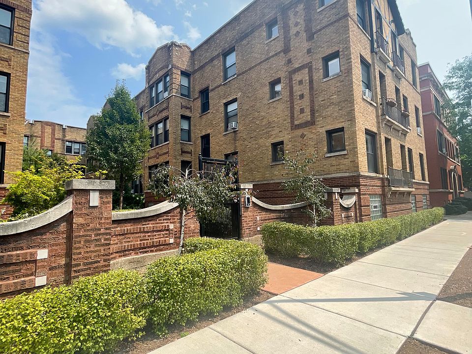 Gated building with blooming courtyard