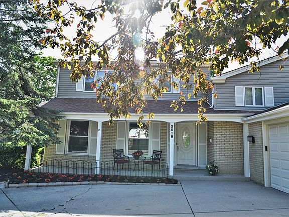 Front entry with nice shaded sitting area