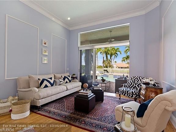 Living room with double crown molding.