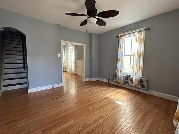 Living room leading into the dining room.