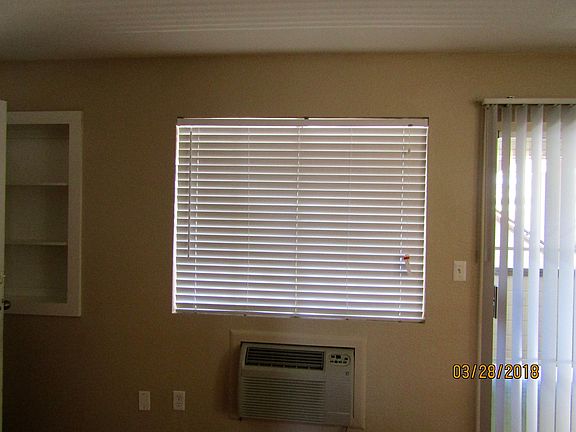 New Wood Faux Blinds in Living room