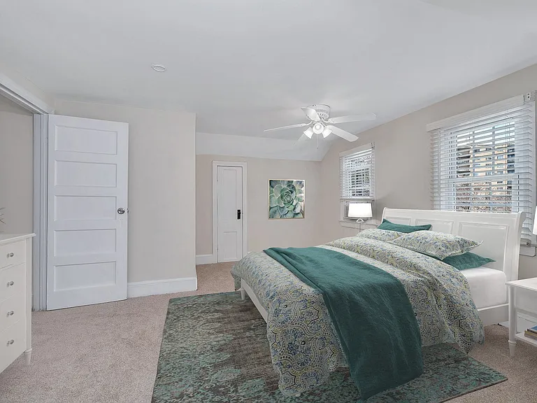 King size bedroom with ceiling fan