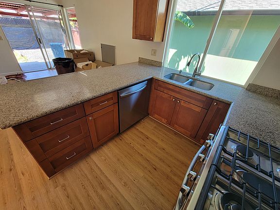 Kitchen with all stainless steel appliances.