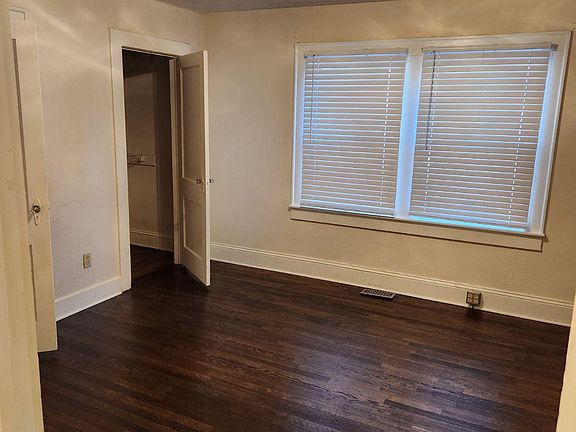 Large bedroom. Window treatments are included throughout the house. Two spacious closets in the bedroom. Large enough for king sized bed.