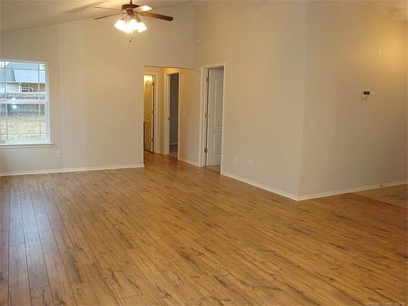 From dining area towards 2 other bedrooms, hall bath and laundry area.