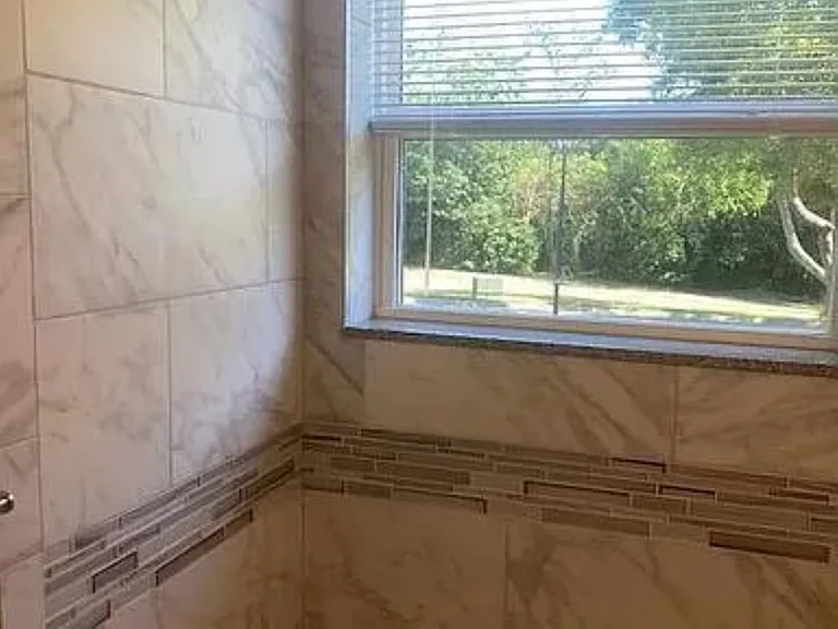 Italian ceramic tile in the tub shower.
