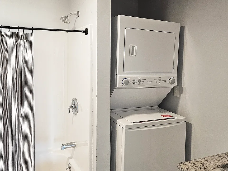 2nd floor bathroom with washer and dryer