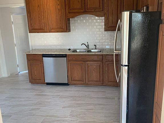 Living room looking into kitchen