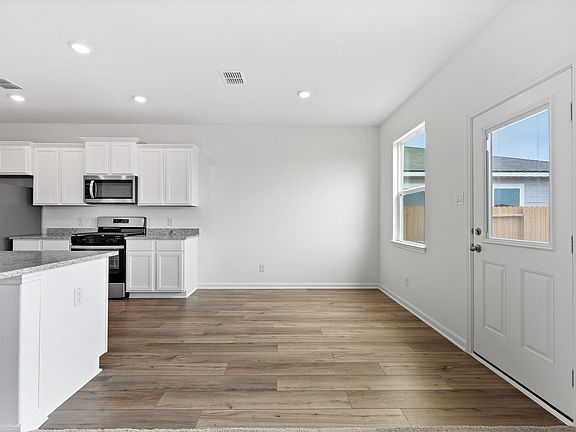 The dining area overlooks the back yard, providing lovely views as you eat.