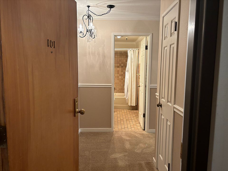Entrance (Coat closet on your right and primary bathroom straight ahead)