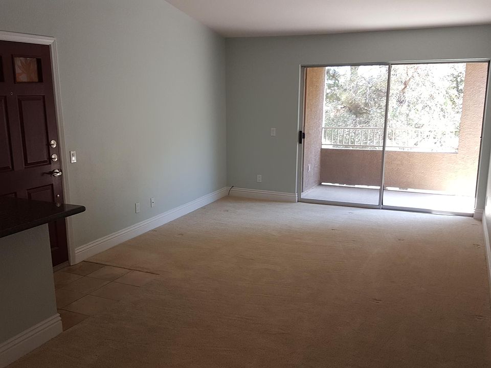 family room with balcony
