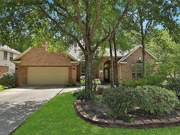 Home has mature landscaping, Front yard sitting area with two lemon bushes.
