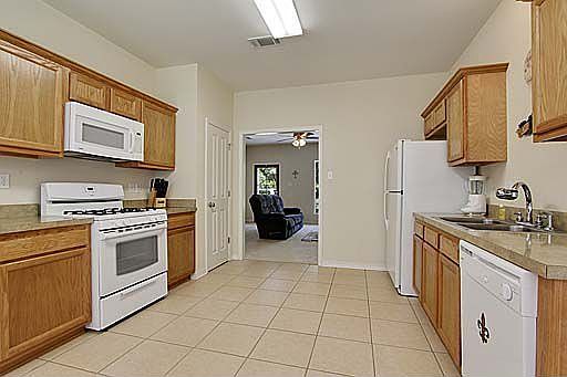 Plenty of cabinetry and a walk-in pantry.