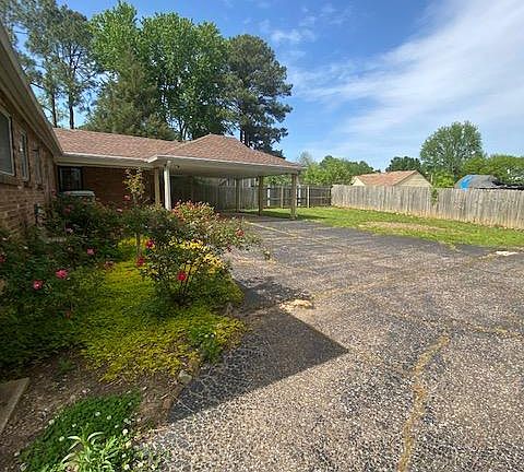off street parking with 2 car carport