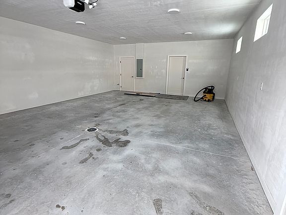 Attached garage goes right into home. 30' 2 car garage, 715 sq ft total.