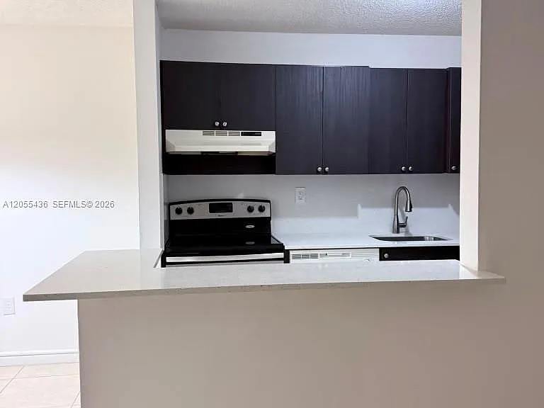 7090 NW 179th St #107 — Photo 5