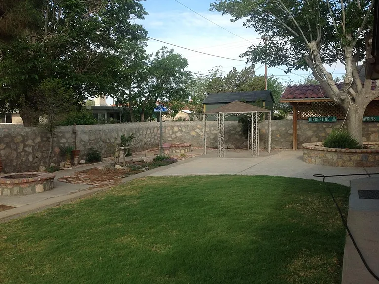 Grass has been removed and cement and rockscape will be added