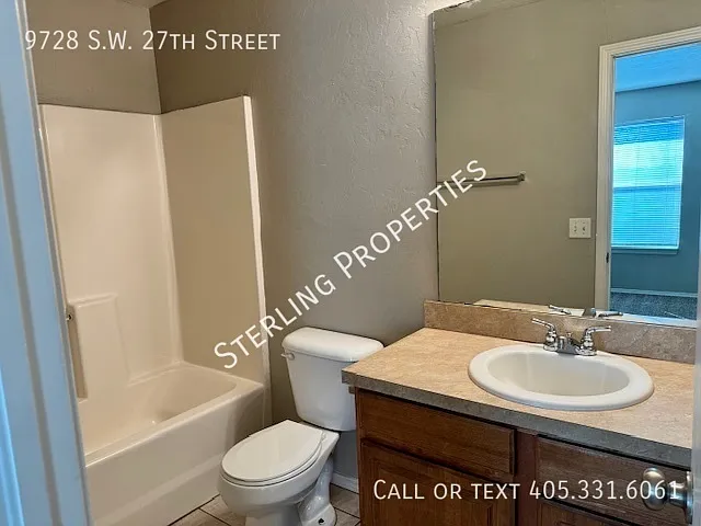9728 SW 27th St — Photo 13
