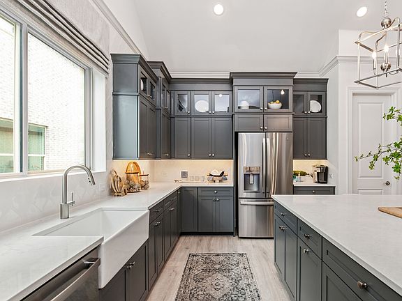 Kitchen with white apron-front sink