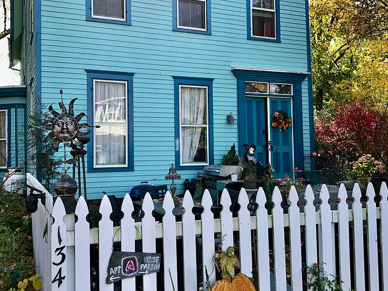 Main house, plenty of off street parking. Fenced front patio seating area. Wheelchair access around side of house. Great neighborhood!