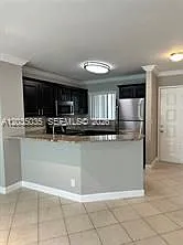 8750 N Sherman Cir #103 — Photo 2