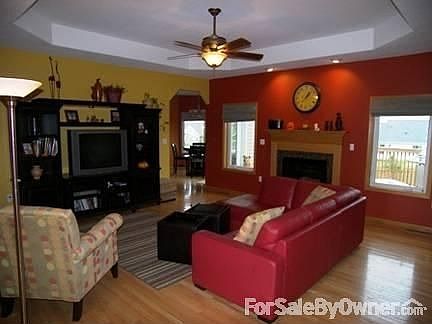 Great Room
						:
						oak floors, 10 foot tray ceiling and oak/granite surround gas fireplace
