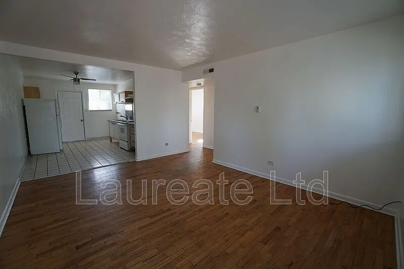 Building Photo - 5550 W 3rd Pl #1