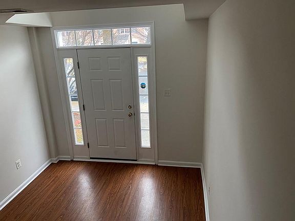 Large open foyer that that bring in plenty of natural light.