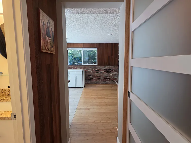 Corridor to bedroom and bathroom.