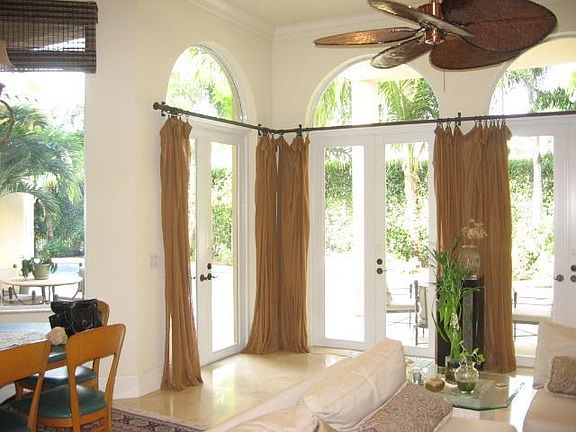 Family room overlooks pool and spa