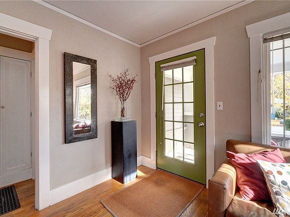 As you enter this 2 bedroom, 1 bath home you are greeted by the living room boasting of craftsman style woodwork and hardwoods. 
