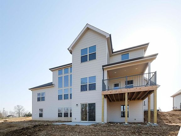 Rear Two Story elevation with Walkout Patio and Covered Deck