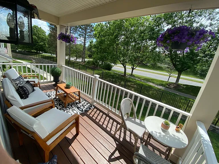 front porch - there is also a full size deck in the back of the home