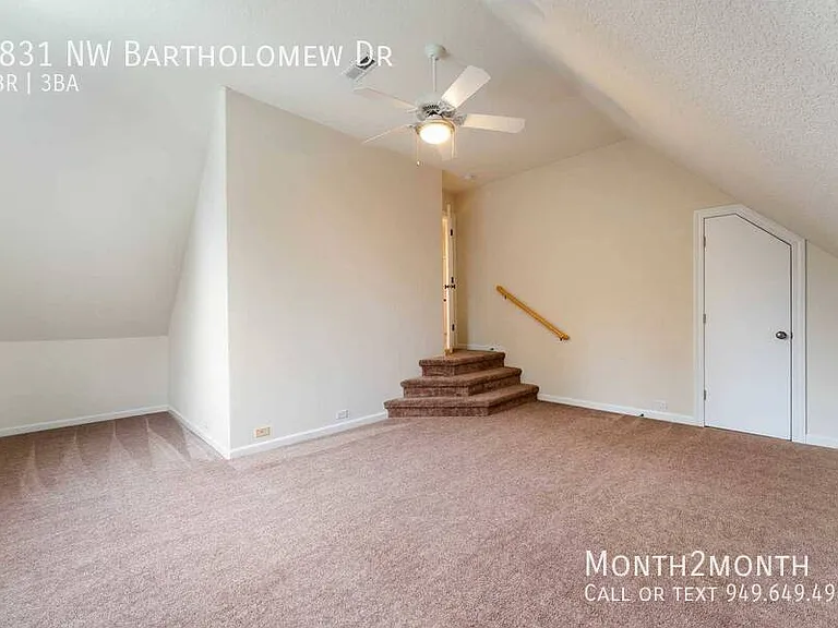 9831 NW Bartholomew Dr — Photo 29