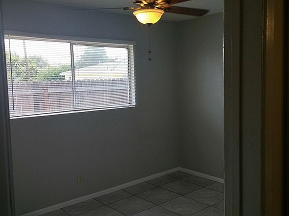 Bedroom 2: ceiling fan. Window AC to be added.