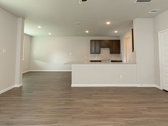 Family Room to Kitchen and Dining Area