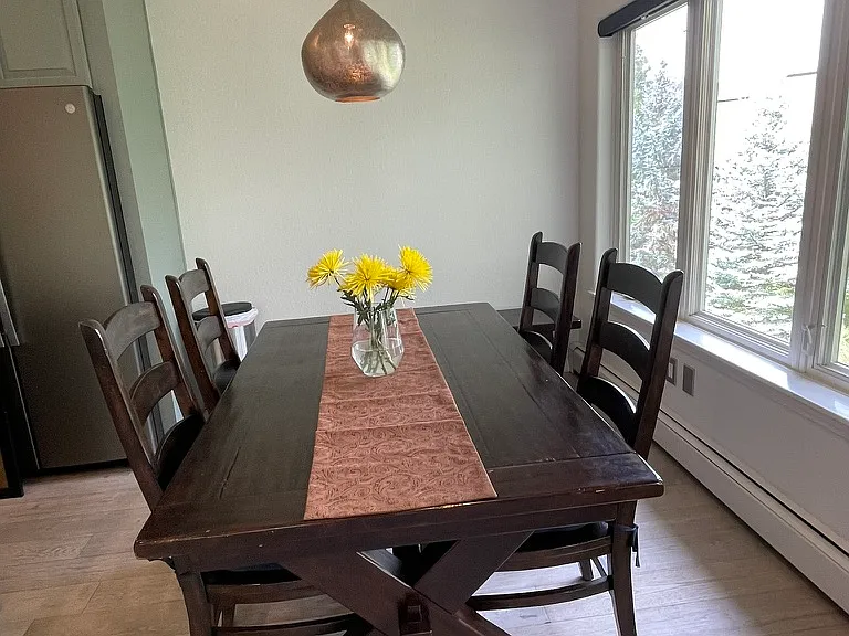 Dining area. William Sonoma table that expands to seat eight.