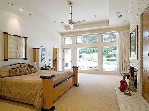 Master Bedroom overlooks the Pool in backyard