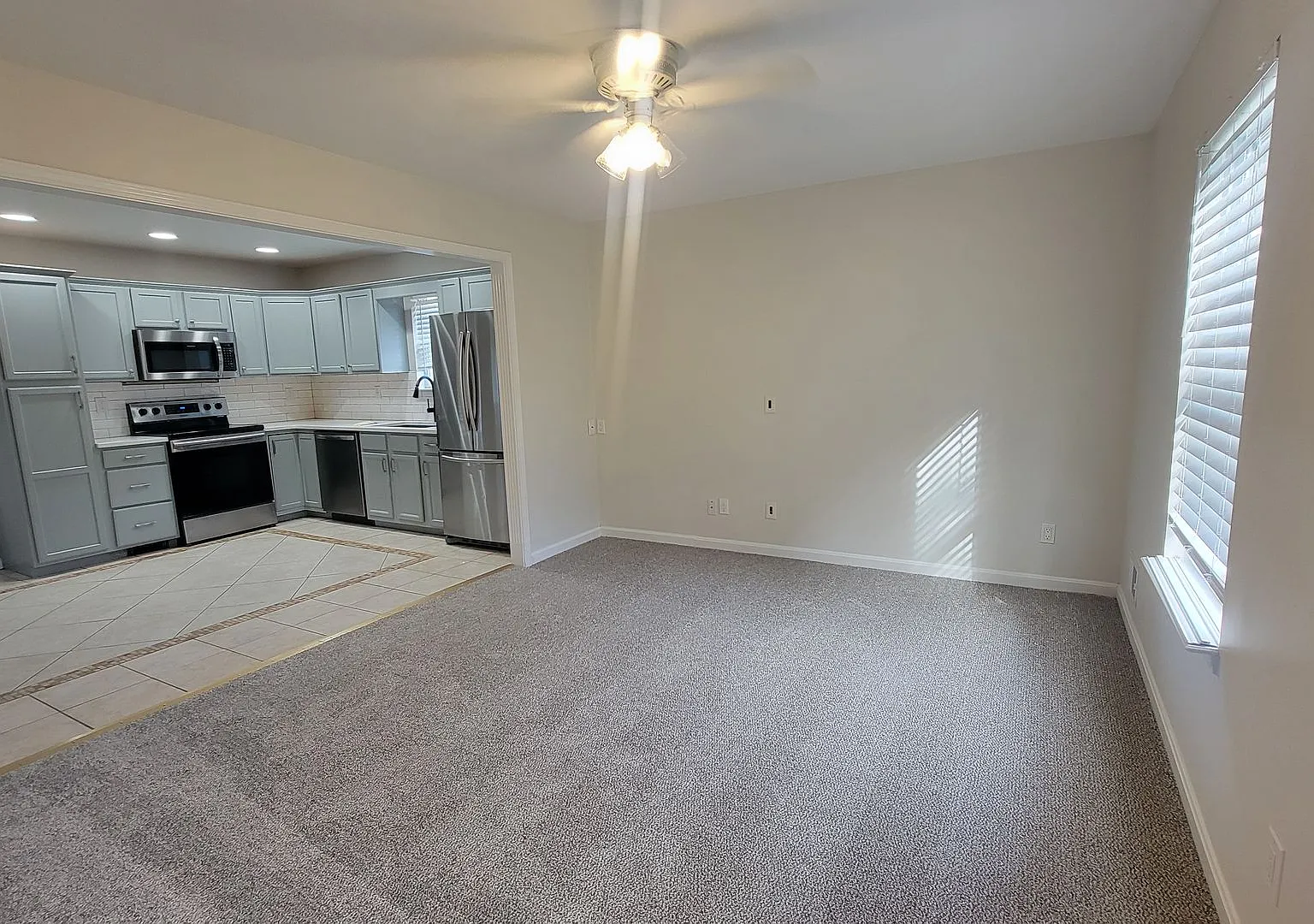 Stunning Open-Concept 3BR Home with Fenced Backyard & Off-Street Parking — Photo 2