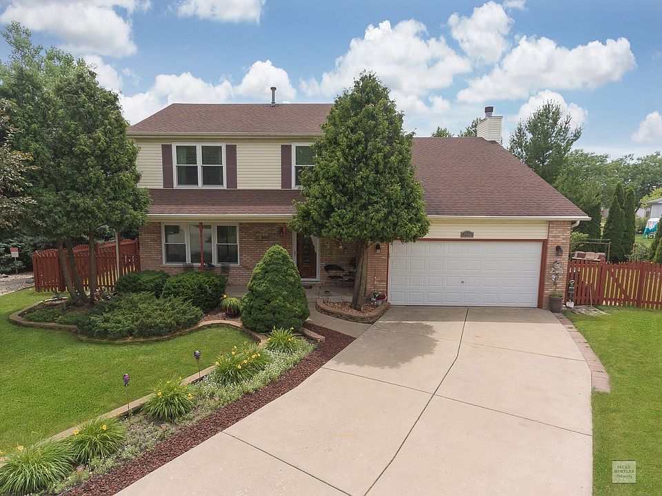 Extra long concrete driveway for plenty of off street parking.