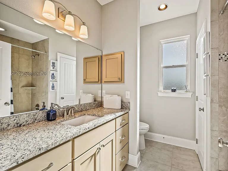Upstairs bathroom with bathtub